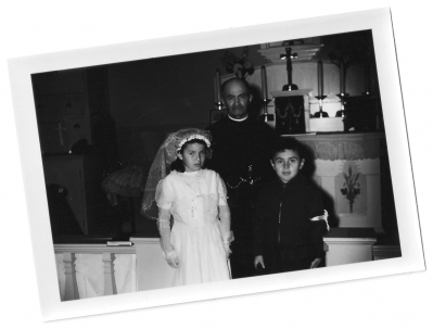 Church missionary baptizing Cree children