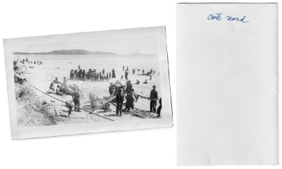 Cree people gathered on shore