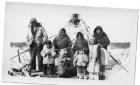 Cree family at their winter teepee camp