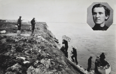Men unload and carry goods up a steep bank