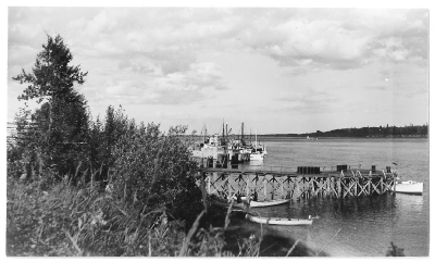 Sailboats at wooden docks on the Moose River